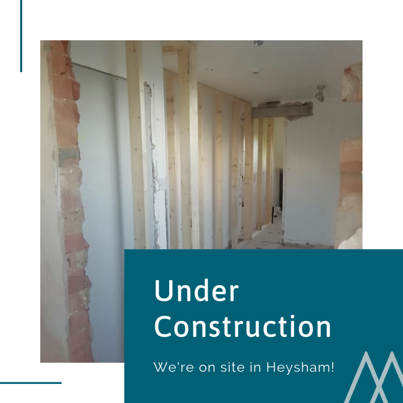 the inside of a house currently under construction with text in the right hand corner saying 'Under Construction, We're on site in Heysham!'